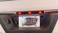 Load image into Gallery viewer, Pic of the Limitless DRW Running Light and License Plate Light Strobe/Warning/Emergency Light kit that fits 2020-2022 Ford Super Duty F250/F350 trucks 
