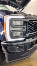 Load image into Gallery viewer, Pic of the Limitless LED C-Ring (DRL) Strobe/Warning/Emergency Light kit that fits 2023-Present Ford Super Duty F250/F350 Alumiduty trucks