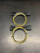 Load image into Gallery viewer, Pic of the Limitless Headlght Plug and Play Accessory harness that fits 2023-Present Ford Super Duty F250/F350