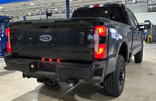 Load image into Gallery viewer, Rear/Side pic of the Limitless Dually Rear Bumper Running Light Plug and Play Harness that fits 2023-Present Ford Super Duty F250/F350 trucks 
