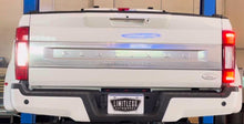 Load image into Gallery viewer, Pic of the Limitless Taillight Running and Reverse Light Strobe/Warning/Emergency Light kit that fits 2020-2022 Ford Super Duty F250/F350 trucks 
