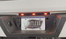 Load and play video in Gallery viewer, Video of the Limitless DRW Running Light and License Plate Light Strobe/Warning/Emergency Light kit that fits 2020-2022 Ford Super Duty F250/F350 trucks 
